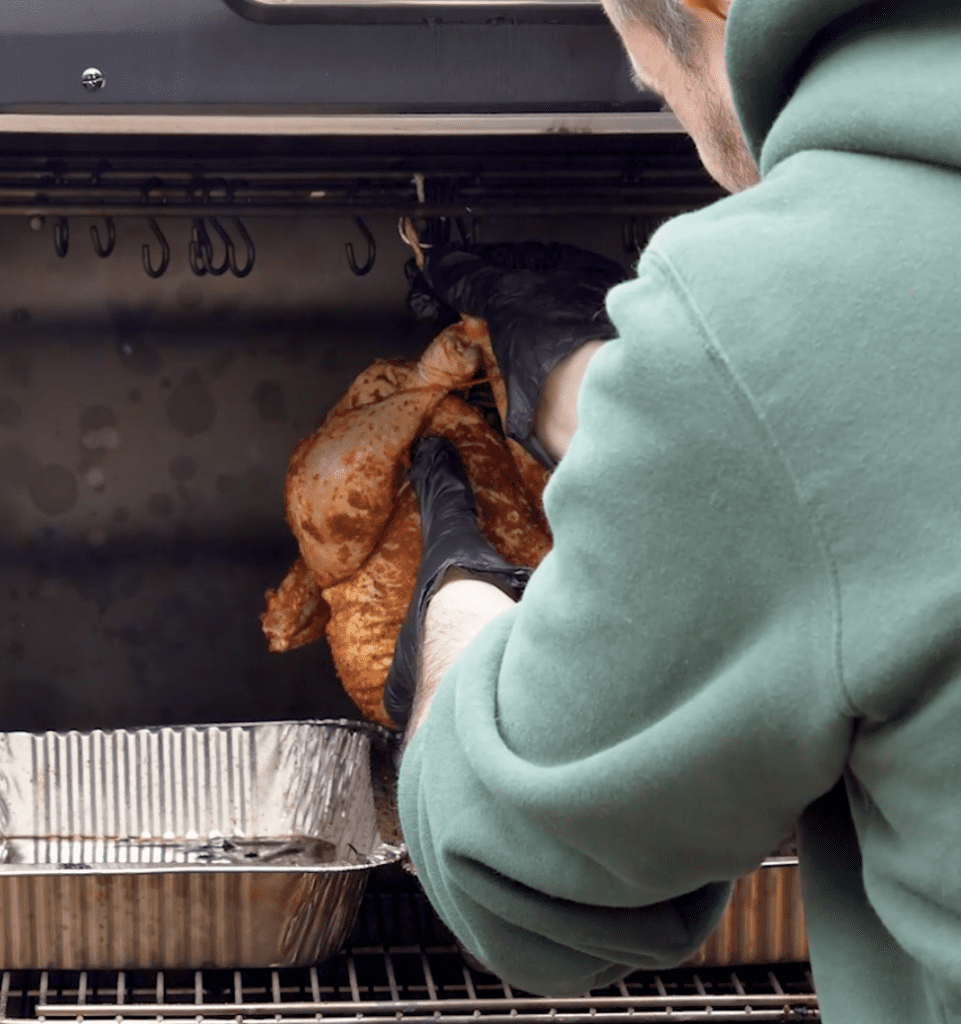 Hanging The Chicken to cook